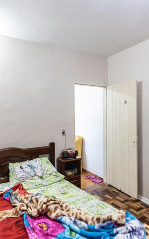 Casa à venda com 101m², 3 quartos e 1 vagaQuarto Casa dos Fundos