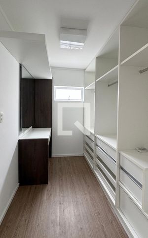 Casa de condomínio para alugar com 400m², 3 quartos e 4 vagasCloset da suíte 2