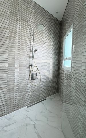 Casa de condomínio para alugar com 400m², 3 quartos e 4 vagasBanheiro da Suíte 1