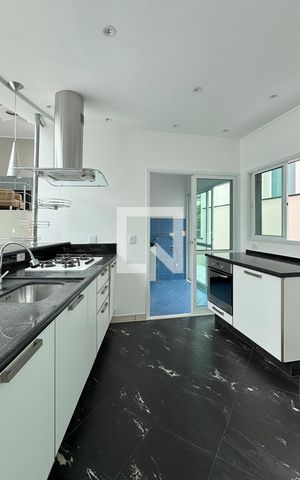 Casa de condomínio para alugar com 400m², 3 quartos e 4 vagasCozinha