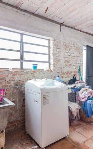 Casa à venda com 336m², 4 quartos e 2 vagas Casa à venda com 336m², 4 quartos e 2 vagasDetalhe da area de serviço