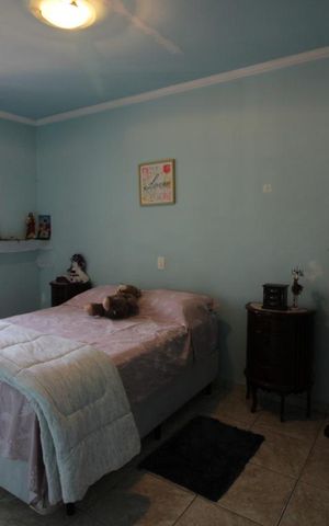 Casa à venda com 175m², 3 quartos e 2 vagasQuarto 1 - Suíte
