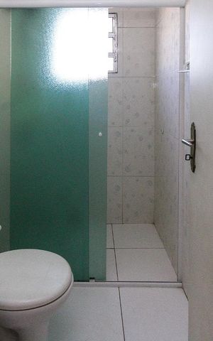 Casa à venda com 246m², 2 quartos e 2 vagasBanheiro da Suite