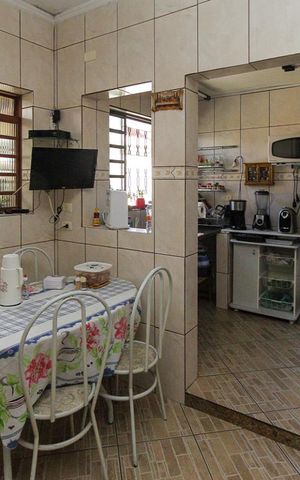 Casa à venda com 275m², 4 quartos e 8 vagas Casa à venda com 275m², 4 quartos e 8 vagasCozinha