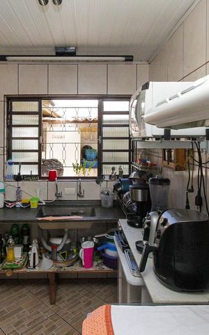 Casa à venda com 275m², 4 quartos e 8 vagas Casa à venda com 275m², 4 quartos e 8 vagasCozinha