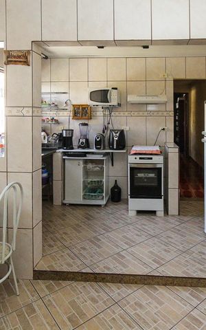 Casa à venda com 275m², 4 quartos e 8 vagas Casa à venda com 275m², 4 quartos e 8 vagasCozinha