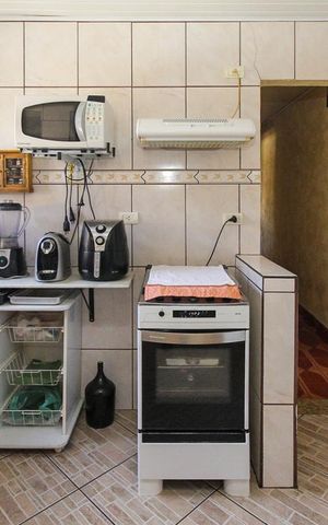 Casa à venda com 275m², 4 quartos e 8 vagas Casa à venda com 275m², 4 quartos e 8 vagasCozinha