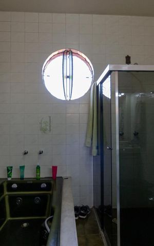 Casa à venda com 360m², 4 quartos e 4 vagasBanheiro da Suíte 1