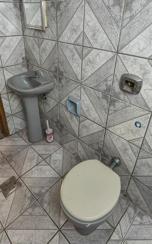 Casa à venda com 300m², 9 quartos e 4 vagasSegundo Pavimento Banheiro 1