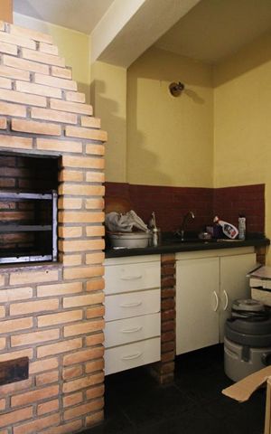 Casa à venda com 205m², 4 quartos e 3 vagasChurrasqueira