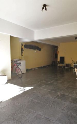 Casa à venda com 205m², 4 quartos e 3 vagasGaragem