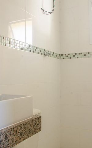 Casa à venda com 105m², 2 quartos e 2 vagas Casa à venda com 105m², 2 quartos e 2 vagasBanheiro da Suíte 2
