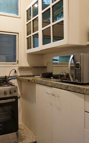 Casa de condomínio para alugar com 260m², 5 quartos e 2 vagasCozinha