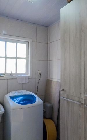 Casa à venda com 150m², 4 quartos e 2 vagasLavanderia