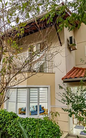 Casa de condomínio à venda com 117m², 4 quartos e 2 vagas Casa de condomínio à venda com 117m², 4 quartos e 2 vagasFachada