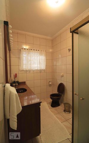 Casa à venda com 400m², 3 quartos e 5 vagasBanheiro da Suíte 1