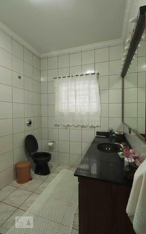 Casa à venda com 400m², 3 quartos e 5 vagasBanheiro da Suíte 2