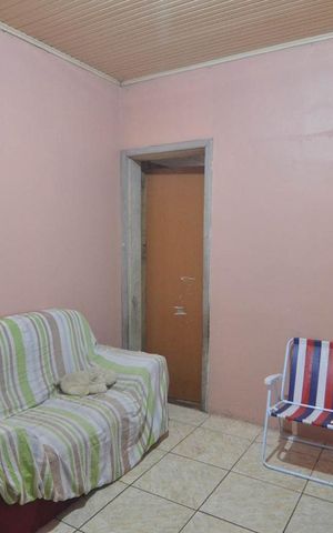 Casa à venda com 92m², 3 quartos e 2 vagasSala