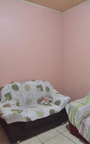 Casa à venda com 92m², 3 quartos e 2 vagasSala