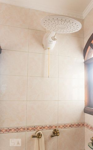 Casa à venda com 332m², 3 quartos e 2 vagasBanheiro Suite 1 