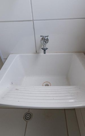 Apartamento à venda com 44m², 2 quartos e 1 vaga Apartamento à venda com 44m², 2 quartos e 1 vagaCozinha e Área de Serviço - Tanque