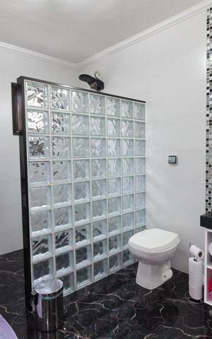 Casa para alugar com 318m², 5 quartos e 8 vagasBanheiro
