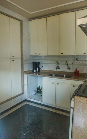 Casa de condomínio para alugar com 380m², 3 quartos e 2 vagasCozinha