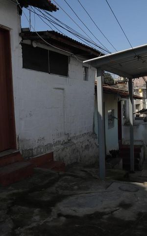 Casa à venda com 440m², 7 quartos e 4 vagasCorredor de acesso a casas