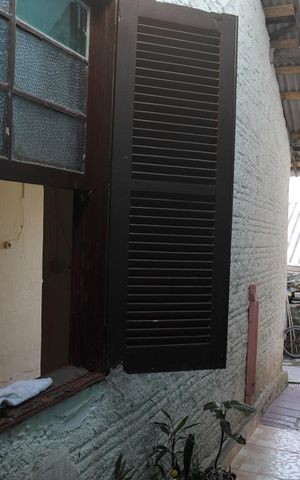 Casa à venda com 440m², 7 quartos e 4 vagasAcesso entre as casas - janela