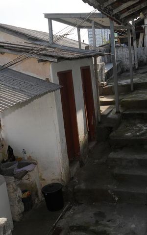 Casa à venda com 440m², 7 quartos e 4 vagasAcesso entre as casas