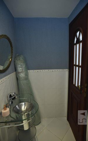 Casa à venda com 444m², 5 quartos e 4 vagasLavabo da Casa de Hospede