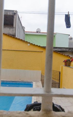 Casa à venda com 227m², 5 quartos e 5 vagas Casa à venda com 227m², 5 quartos e 5 vagasVista Sala
