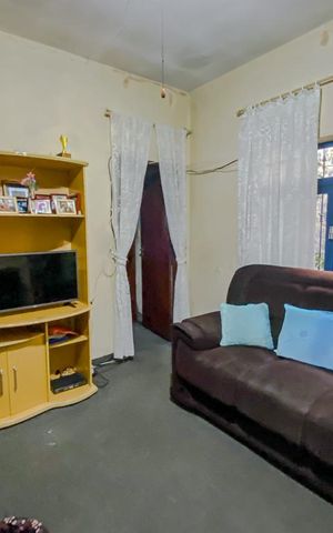 Casa à venda com 210m², 3 quartos e 2 vagasSala