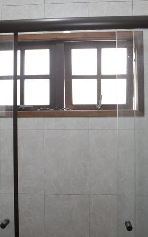 Casa à venda com 150m², 3 quartos e 3 vagasBanheiro entre Quarto 2 e 3