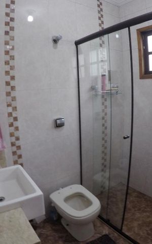 Casa à venda com 150m², 3 quartos e 3 vagasBanheiro entre Quarto 2 e 3