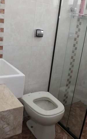 Casa à venda com 150m², 3 quartos e 3 vagasBanheiro entre Quarto 2 e 3