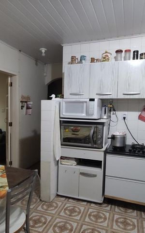Casa à venda com 250m², 4 quartos e 7 vagas Casa à venda com 250m², 4 quartos e 7 vagasCozinha