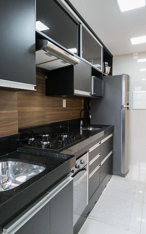 Apartamento à venda com 53m², 2 quartos e 1 vagaCozinha e Área de Serviço