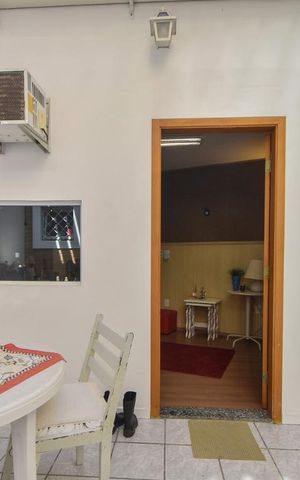 Casa à venda com 190m², 4 quartos e 2 vagasÁrea de Externa com churrasqueira