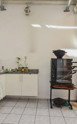Casa à venda com 190m², 4 quartos e 2 vagasÁrea de Externa com churrasqueira
