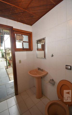Casa à venda com 240m², 4 quartos e 2 vagasBanheiro da Churrasqueira