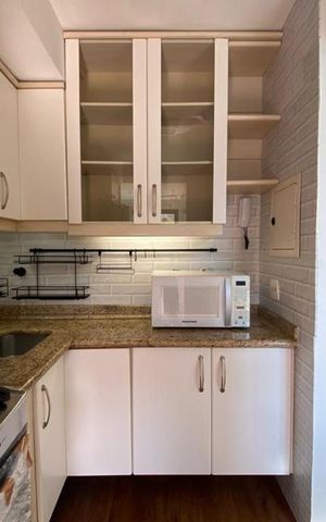 Studio à venda com 63m², 1 quarto e 2 vagas Studio à venda com 63m², 1 quarto e 2 vagasCozinha