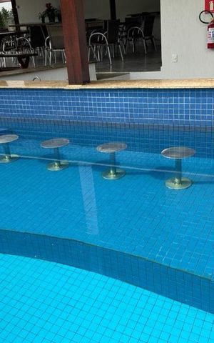 Studio à venda com 63m², 1 quarto e 2 vagas Studio à venda com 63m², 1 quarto e 2 vagasÁrea comum - Piscina