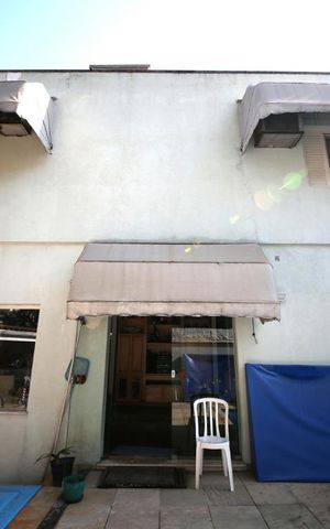 Casa à venda com 350m², 3 quartos e 4 vagasFachada Posterior