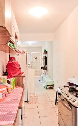 Casa à venda com 60m², 3 quartos e 1 vaga Casa à venda com 60m², 3 quartos e 1 vagaCozinha