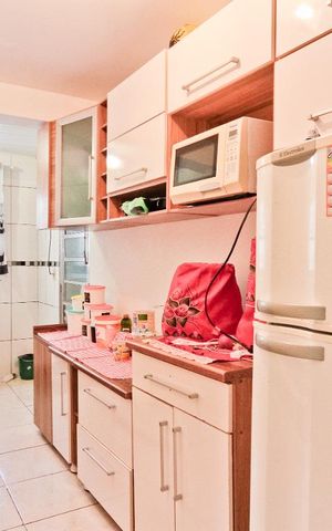 Casa à venda com 60m², 3 quartos e 1 vaga Casa à venda com 60m², 3 quartos e 1 vagaCozinha