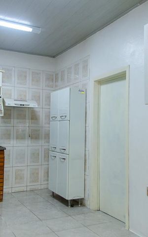 Casa à venda com 150m², 3 quartos e 2 vagas Casa à venda com 150m², 3 quartos e 2 vagasCozinha
