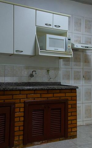 Casa à venda com 150m², 3 quartos e 2 vagas Casa à venda com 150m², 3 quartos e 2 vagasCozinha
