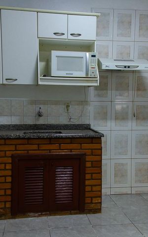 Casa à venda com 150m², 3 quartos e 2 vagas Casa à venda com 150m², 3 quartos e 2 vagasCozinha