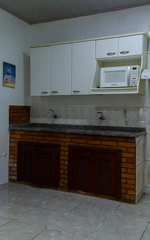 Casa à venda com 150m², 3 quartos e 2 vagas Casa à venda com 150m², 3 quartos e 2 vagasCozinha